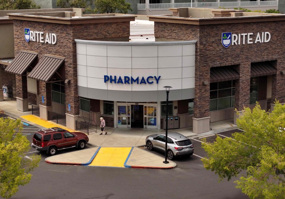 SAN RAFAEL, CALIFORNIA - JUNE 20: In an aerial view, a customer leaves a Rite Aid store on June 20, 2024. JUSTIN SULLIVAN