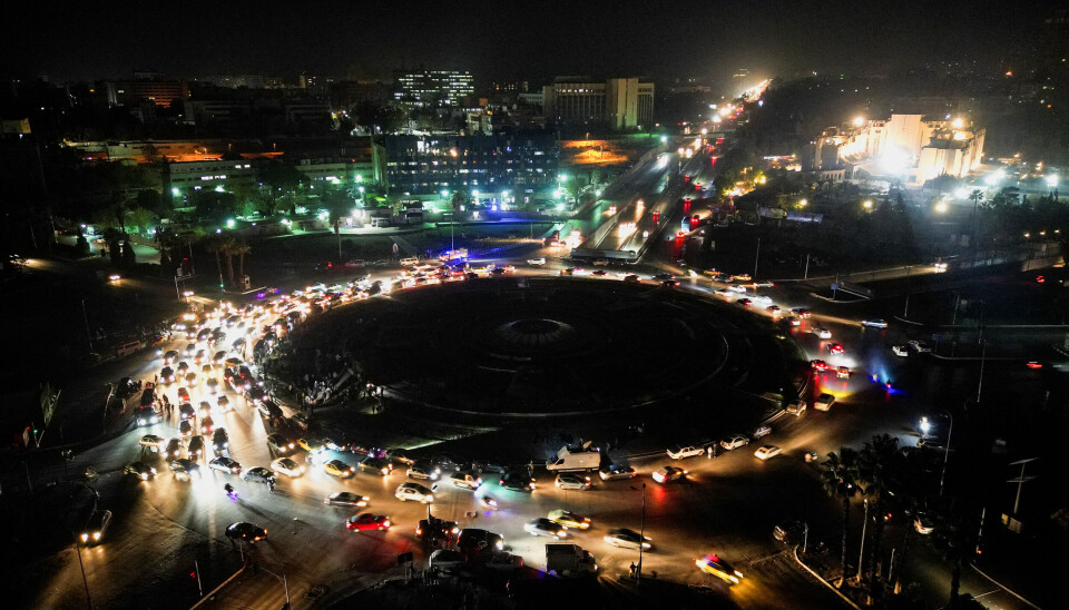 An aerial view of a city at night.