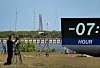Countdown clock and Artemis II rocket on Launch Pad 39B at Kennedy Space Center